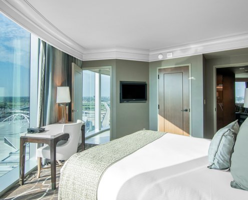 Omni Dallas Luxury Corner Suite Bedroom View