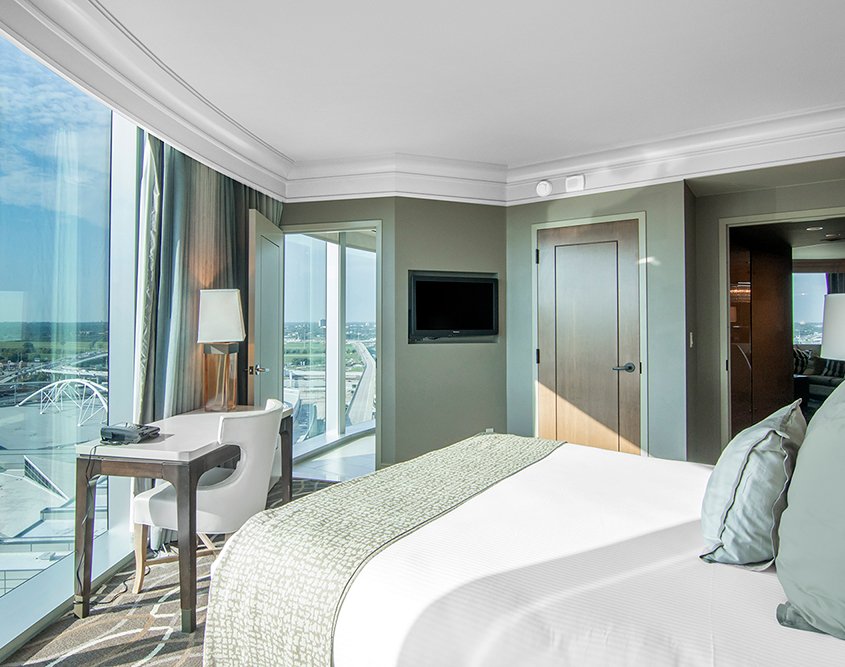 Omni Dallas Luxury Corner Suite Bedroom View