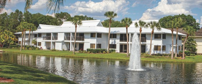 Saddlebrook Resort Buildings with White Roof and Fountain