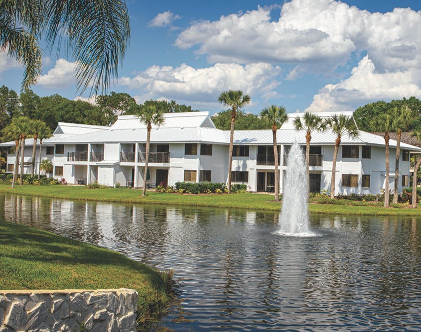 Saddlebrook Resort Buildings with White Roof and Fountain