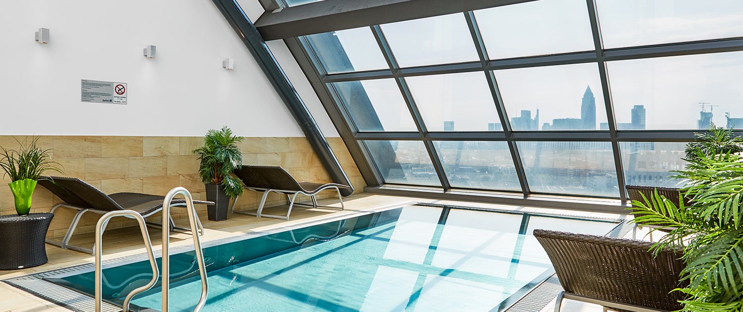 Radisson Blu Hotel Frankfurt Indoor Pool with view of city