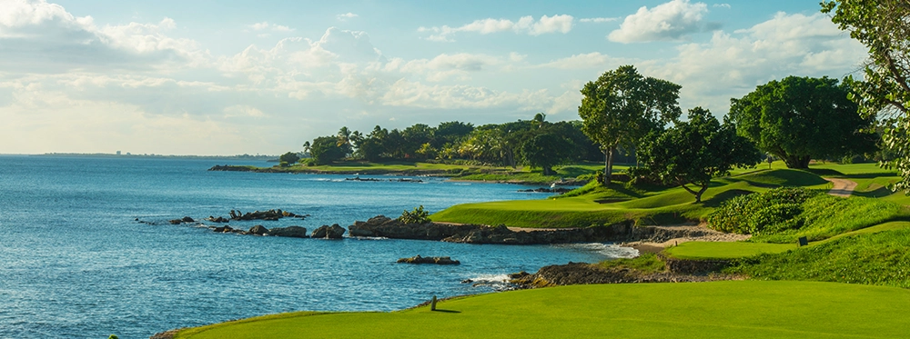 Casa de Campo is one of the best golf resorts in the Caribbean. Shot of golf course by the ocean.