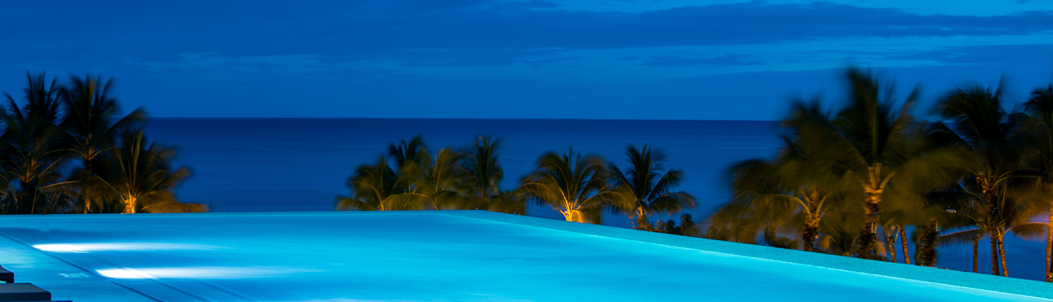 ‘Alohilani Resort Waikiki Beach: shot of the ocean view infinity pool at dusk