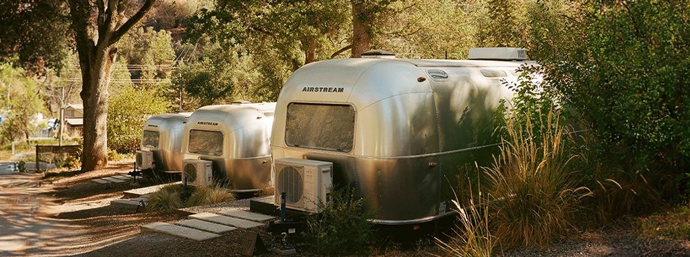 Unique event venue, Autocamp Airstreams lined up in the woods