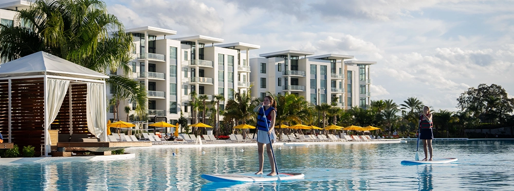 Person paddle boarding in Everemore Lagoon