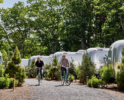 Unique event venue, Autocamp airstreams lined up near a forest