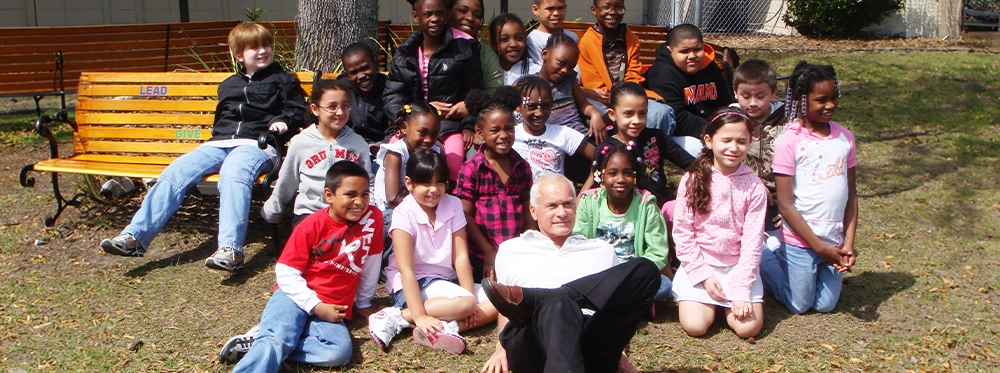 Harris Rosen with a group of students