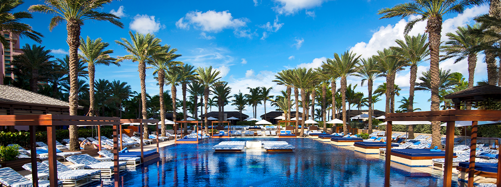 Atlantis Paradise Island Bahamas poolside view surrounding palm trees