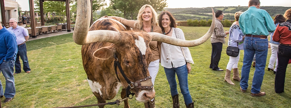 A Texas Longhorn adds a uniquely local touch to an event