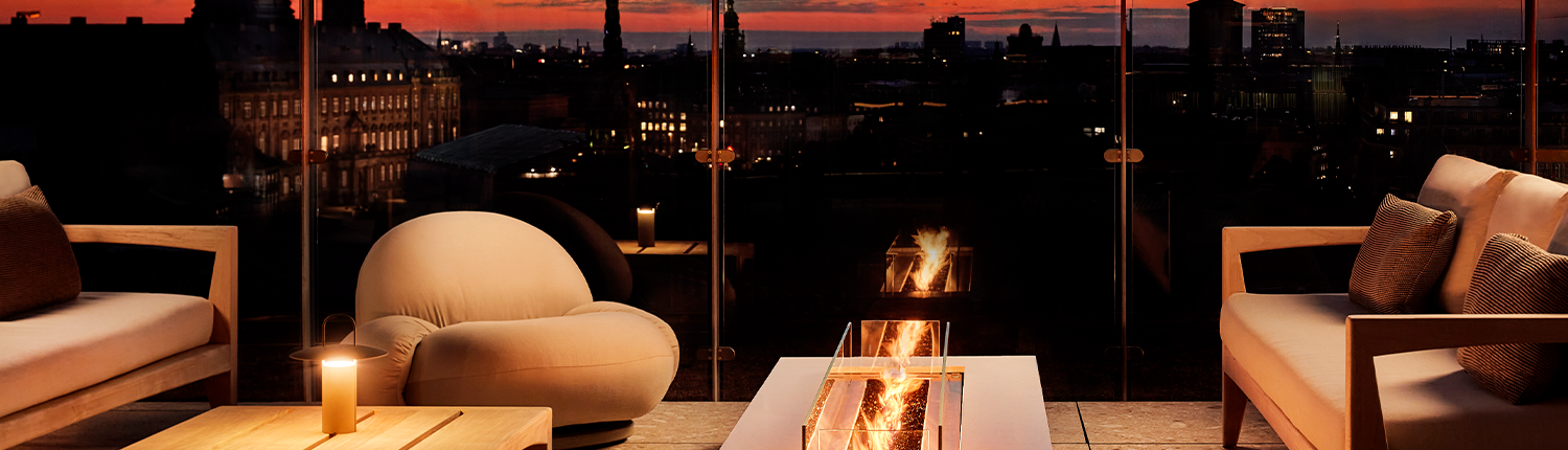 NH Collection Copenhagen - Outdoor Firepit at Night