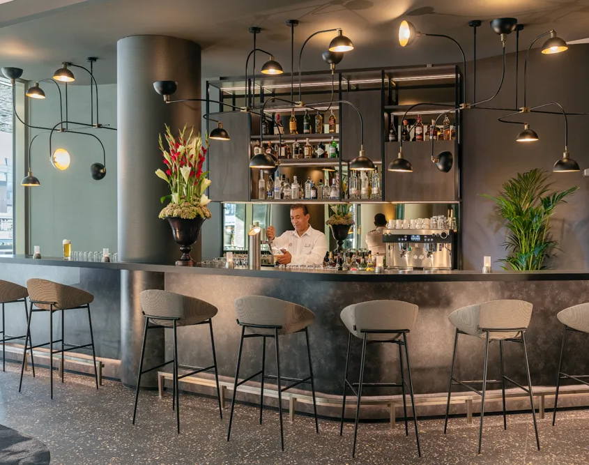 NH Collection Munich Bavaria - Bar with Bartender