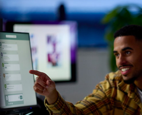 Man Working with AI on Computer