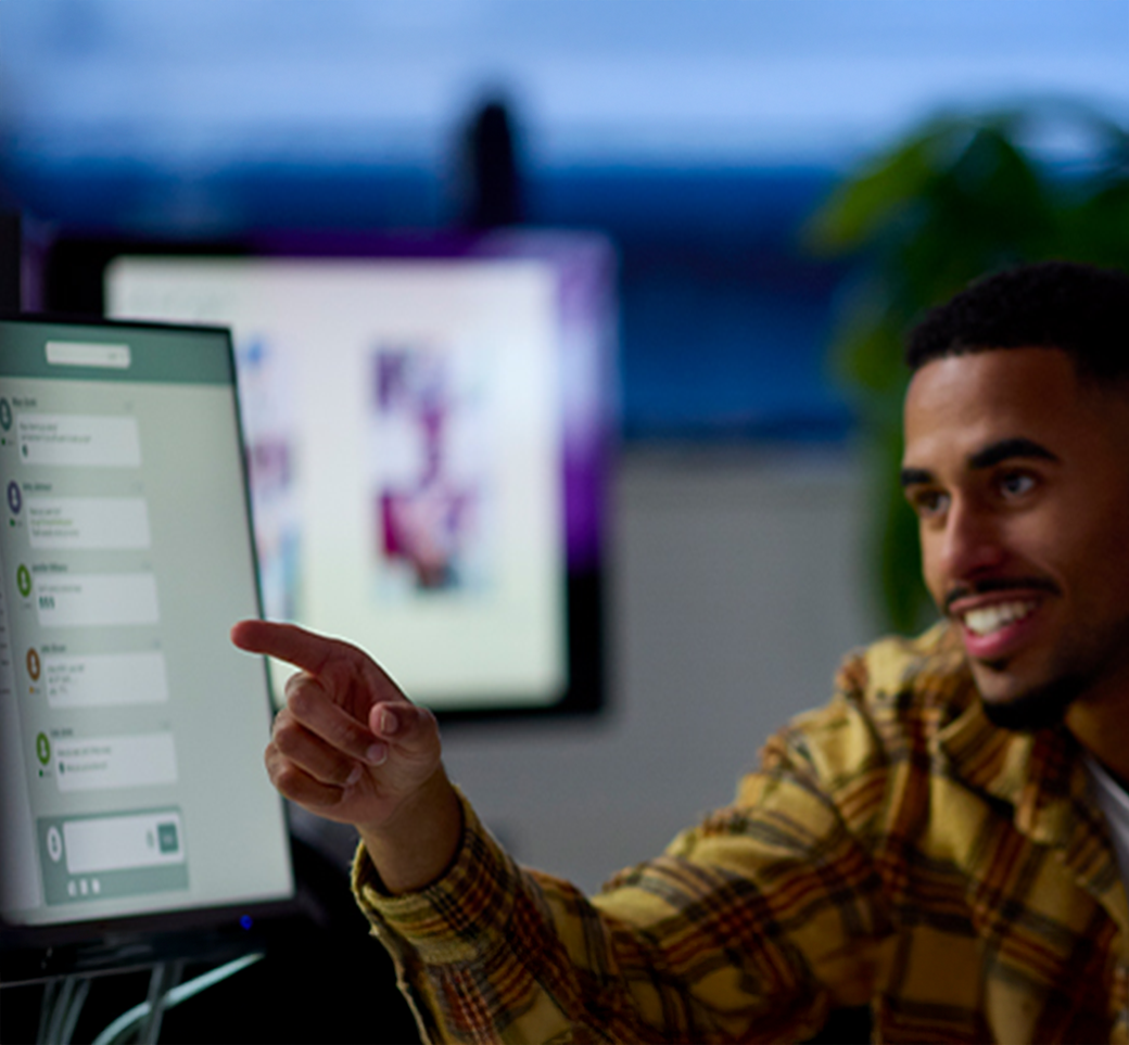 Working with AI Man Working with AI on Computer