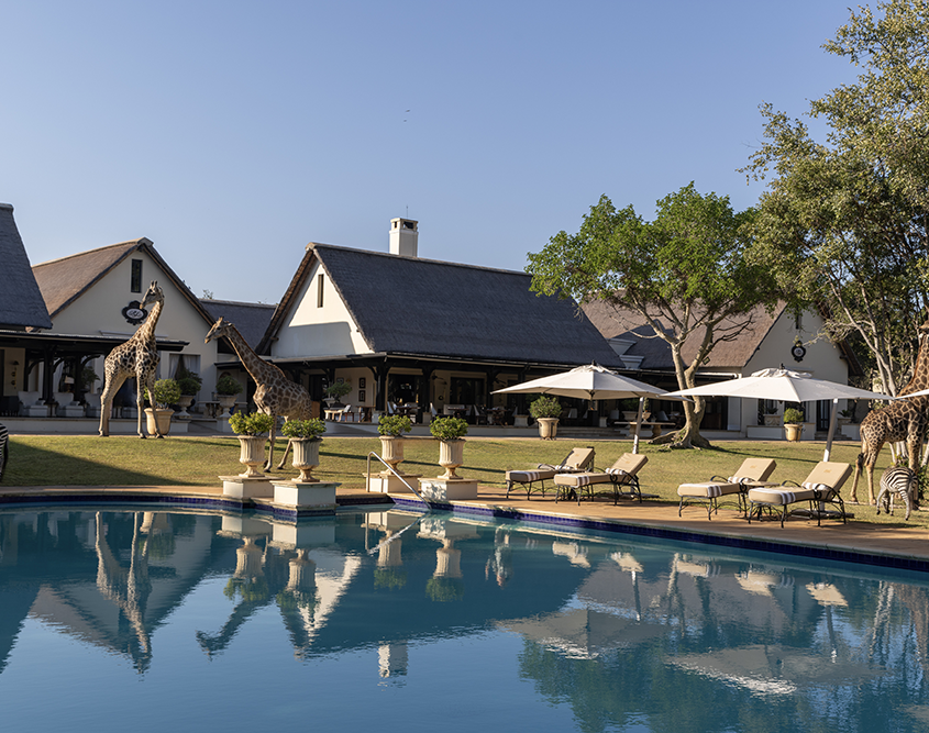 The Royal Livingstone Victoria Falls Zambia Hotel by Anantara - Pool with Giraffes and Zebras The Royal Livingstone Victoria Falls Zambia Hotel by Anantara - Pool with Giraffes and Zebras
